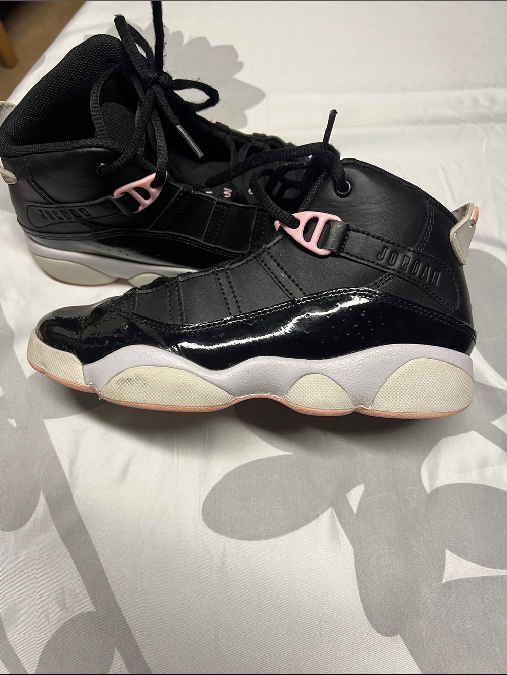 Jordan Black Sneakers with Pink Accents and White Midsole